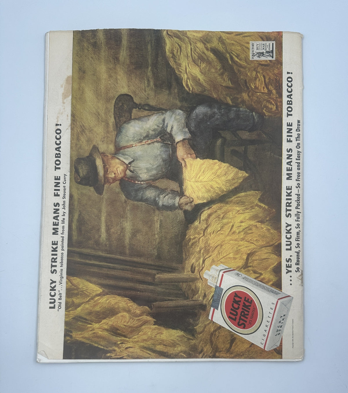 Back cover of Collier’s Magazine from May 22, 1943, displaying a vintage advertisement for Lucky Strike tobacco, featuring an illustration of a farmer.