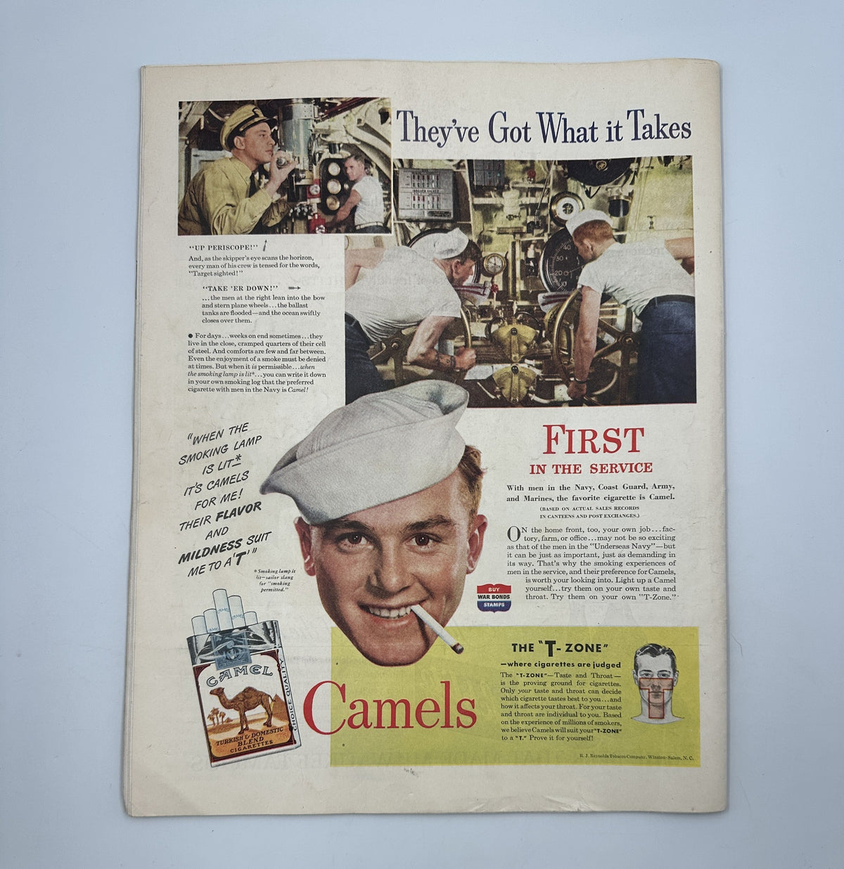 Back cover of Collier’s Magazine July 24, 1943 showcasing an advertisement for Camels cigarettes featuring a smiling sailor and highlighted text about the product.