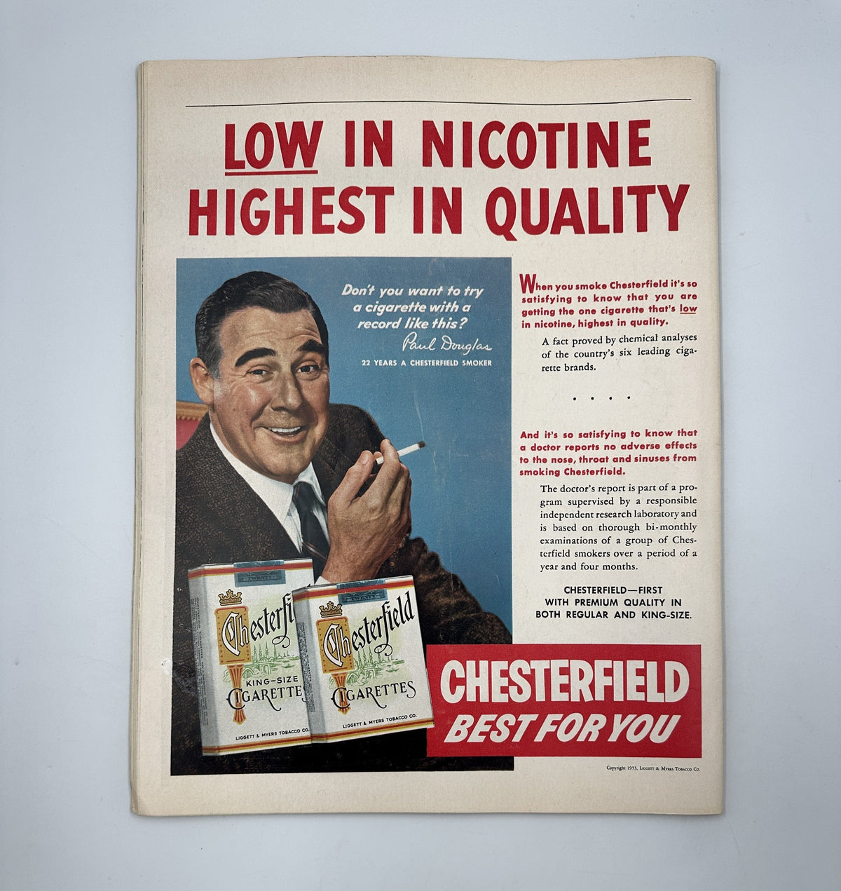 Vintage advertisement featuring Chesterfield cigarettes, promoting low nicotine and high quality, from Collier’s Magazine October 2, 1953, which also includes an interview with Madame Tito.
