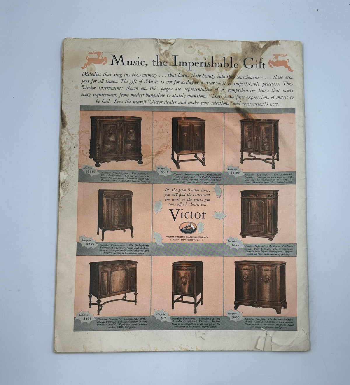 Another vintage advertisement titled 'Music the Imperishable Gift' from Collier’s Magazine December 17, 1927, displaying various Victor audio furniture options, showing the historical advertising style of the era.