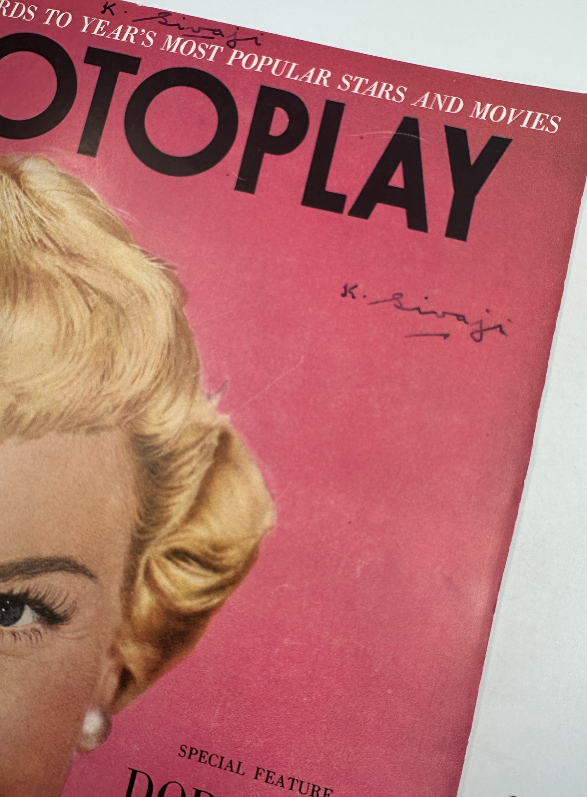 Close-up of the cover of Photoplay Magazine March 1952 displaying Doris Day's portrait, with identifiable handwriting above the magazine title.