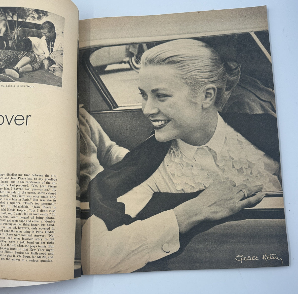 A charming photograph of Grace Kelly from Screen Album Magazine, November 1955, depicting her in a stylish car, showcasing her elegance and classic beauty.