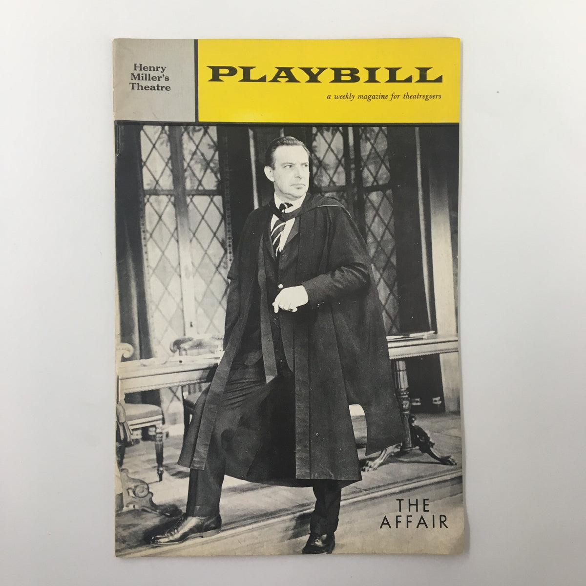 1962 Playbill for C.P. Snow's The Affair at Henry Miller's Theatre, featuring a classic vintage design with a prominent image of a man in formal attire, capturing the essence of early 1960s theatrical performance.