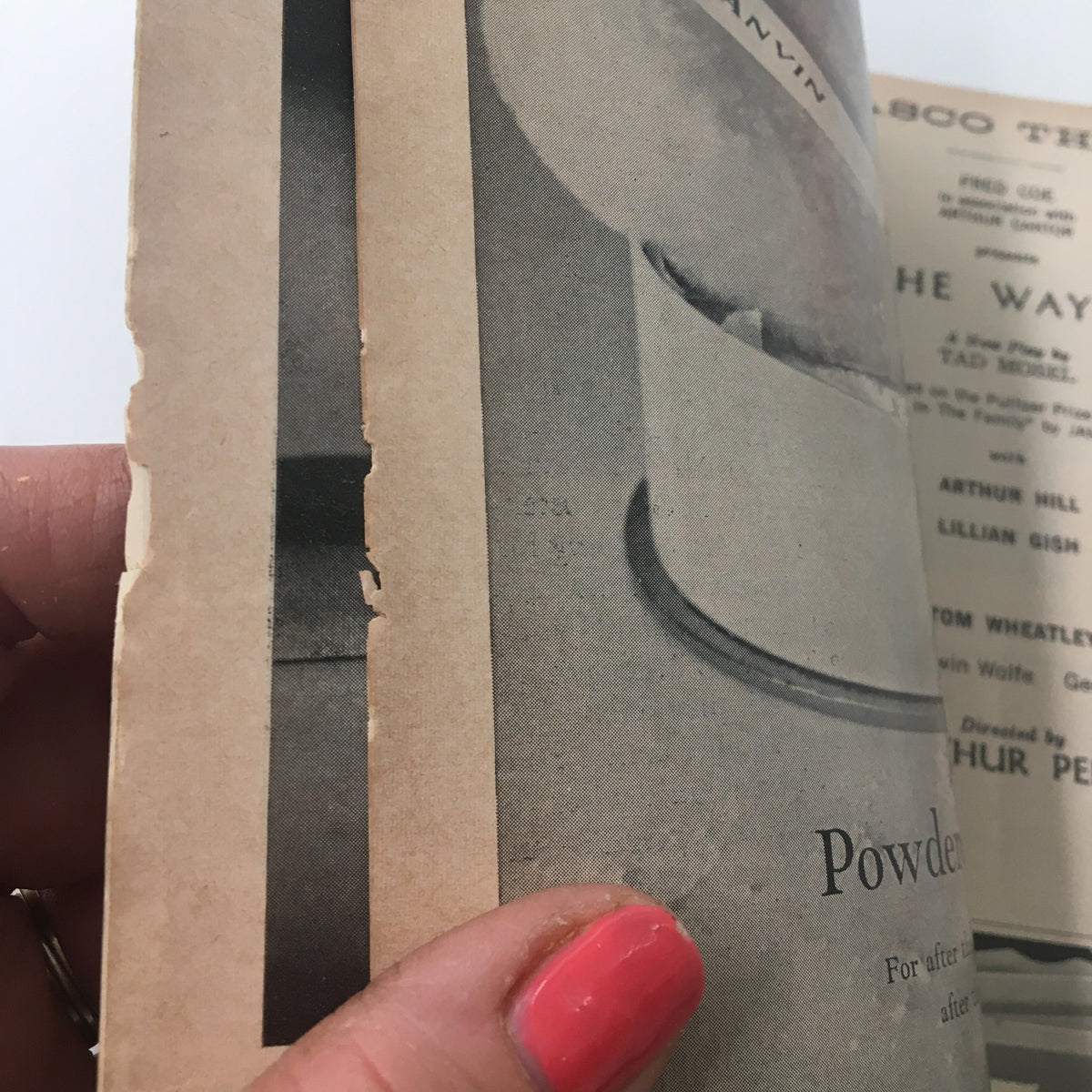 Close-up view of the 1961 Playbill from Belasco Theatre for All The Way Home, highlighting the aged page with minor wear for collectors of vintage theater memorabilia.