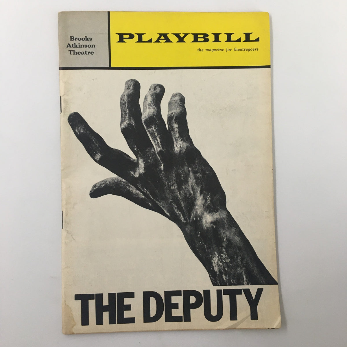 1964 Playbill for The Deputy at Brooks Atkinson Theatre showcasing a dramatic cover design featuring a hand in black and white.