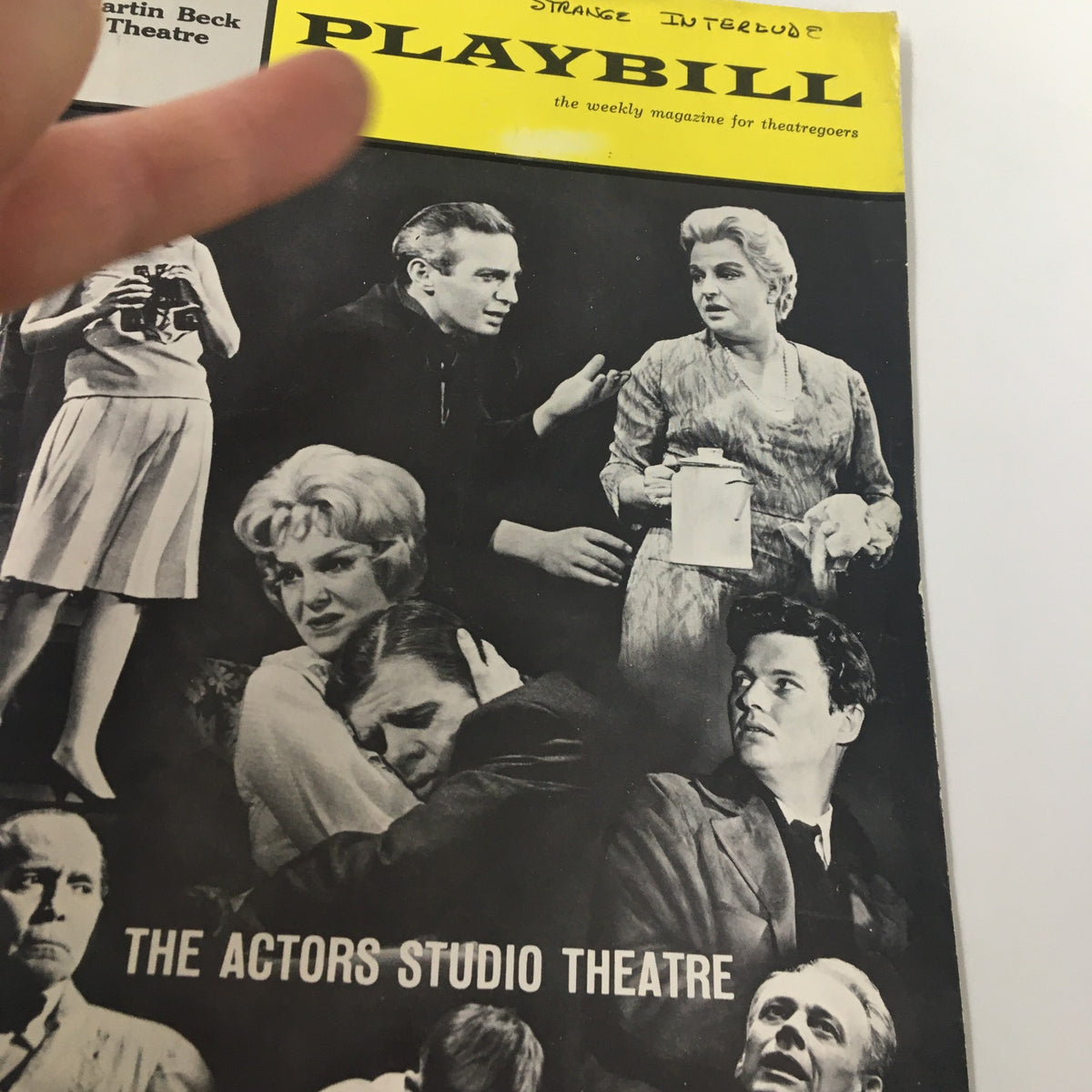 Close-up of the 1963 Playbill Martin Beck Theatre for Strange Interlude, highlighting featured actors and scenes in black and white.