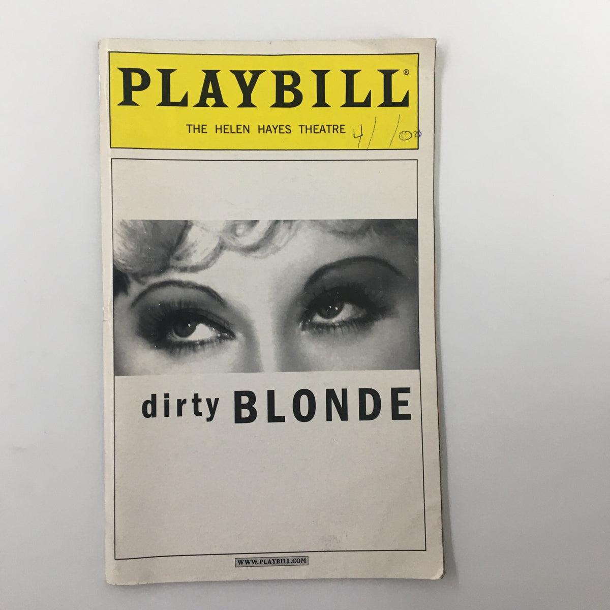 2000 Playbill for 'Dirty Blonde' at the Helen Hayes Theatre, featuring a close-up of Mae West's eyes, showcasing theatrical memorabilia.
