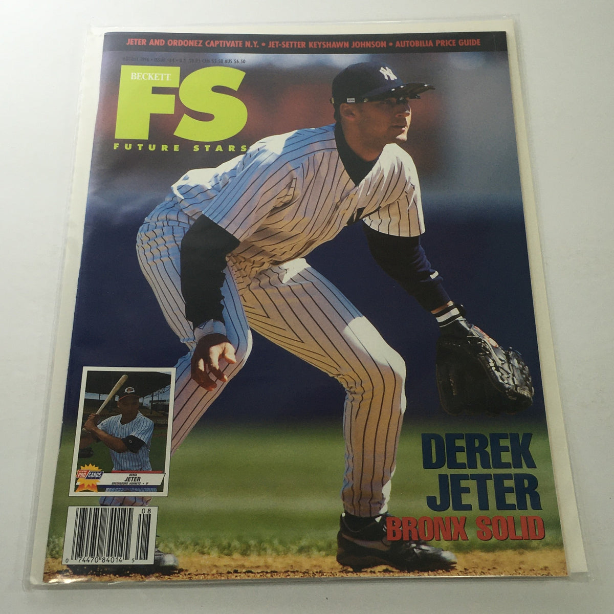 Beckett Future Stars: August 1996 Issue #64 featuring Derek Jeter in a Bronx Solid outfit, showcasing him in action on the cover. This collectible magazine is in excellent condition with a protective covering, making it a prized item for baseball and sports memorabilia enthusiasts.