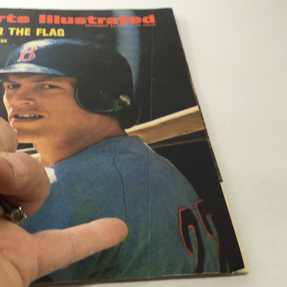 Close-up of the cover of Sports Illustrated: September 25, 1972, highlighting Boston's Carlton Fisk and the issue's title "Four For The Flag."