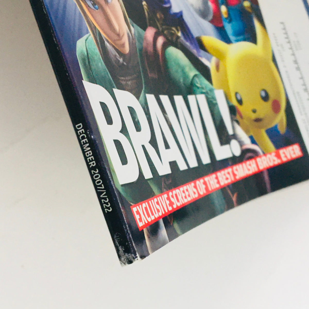 Side view of Nintendo Power Magazine December 2007 emphasizing the title 'BRAWL!' with focus on Super Smash Bros and gaming highlights.
