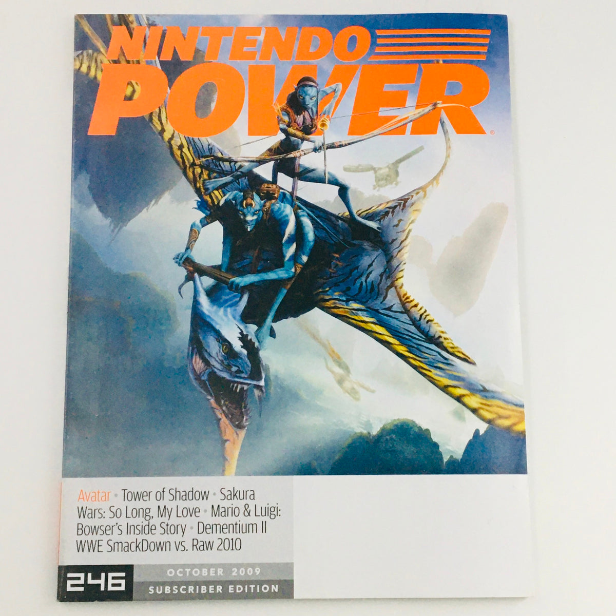 Cover of Nintendo Power Magazine, October 2009 issue featuring Avatar and Tower of Shadow, issue number 246, with a vibrant illustration of characters flying on a dragon.