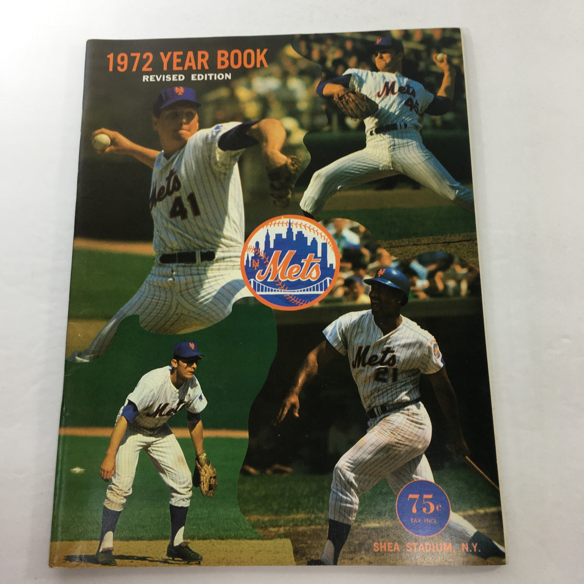 Cover of the New York Mets 1972 Year Book Revised Edition featuring images of players in action, showcasing the team's history and nostalgia for baseball fans.