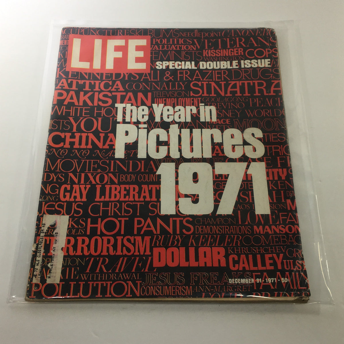 Cover of VTG Life Magazine: December 31 1971 - Double Issue The Year In Pictures 1971, showcasing a bold design with prominent text and vibrant imagery capturing significant events and themes from the year.