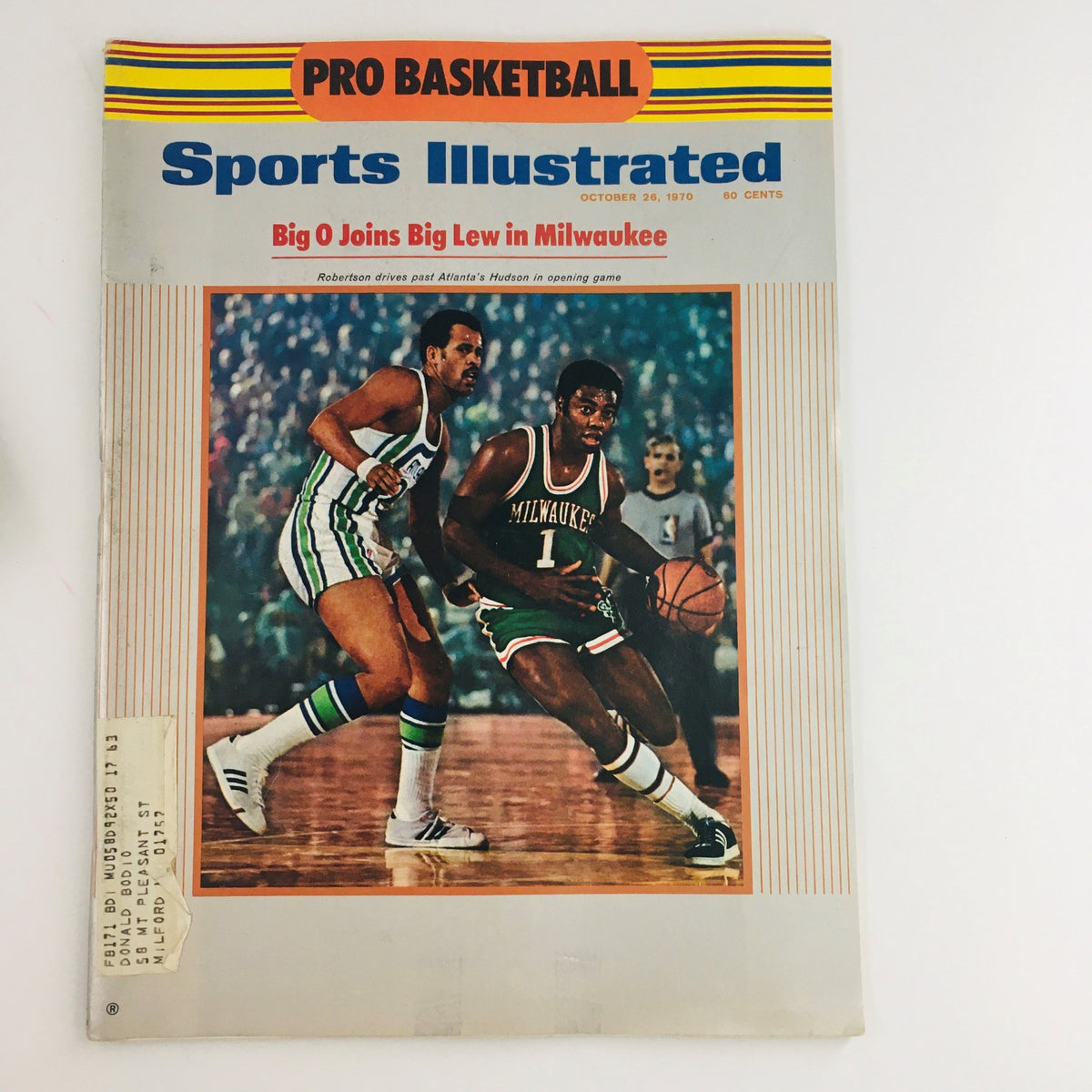 Sports Illustrated Magazine cover from October 26, 1970 featuring Oscar Robertson and Kareem Abdul-Jabbar playing basketball, showcasing the excitement of NBA action.