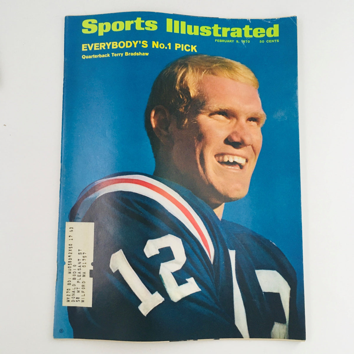 Sports Illustrated Magazine February 9 1970 featuring quarterback Terry Bradshaw, showcasing his smile and iconic jersey number 12, highlighting his status as the No.1 draft pick in a vintage sports collectible.