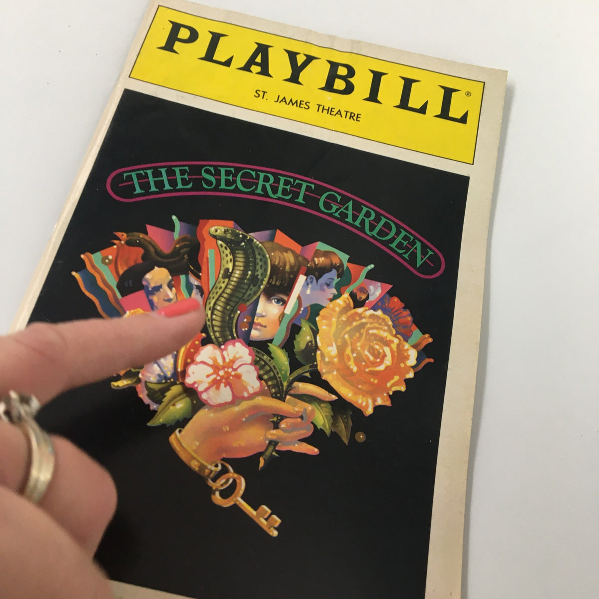 1991 Playbill for The Secret Garden at St. James Theatre featuring colorful artwork and a key motif, showcasing the enchanting theme of the musical.