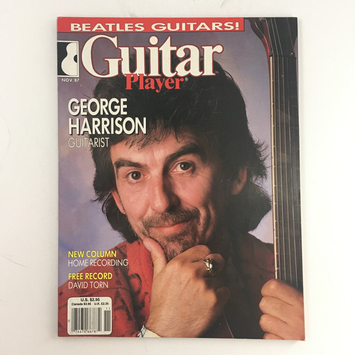 Guitar Player Magazine cover from November 1987 featuring George Harrison, known for his work as a guitarist in The Beatles. The magazine highlights Harrison alongside articles on music history and innovation.