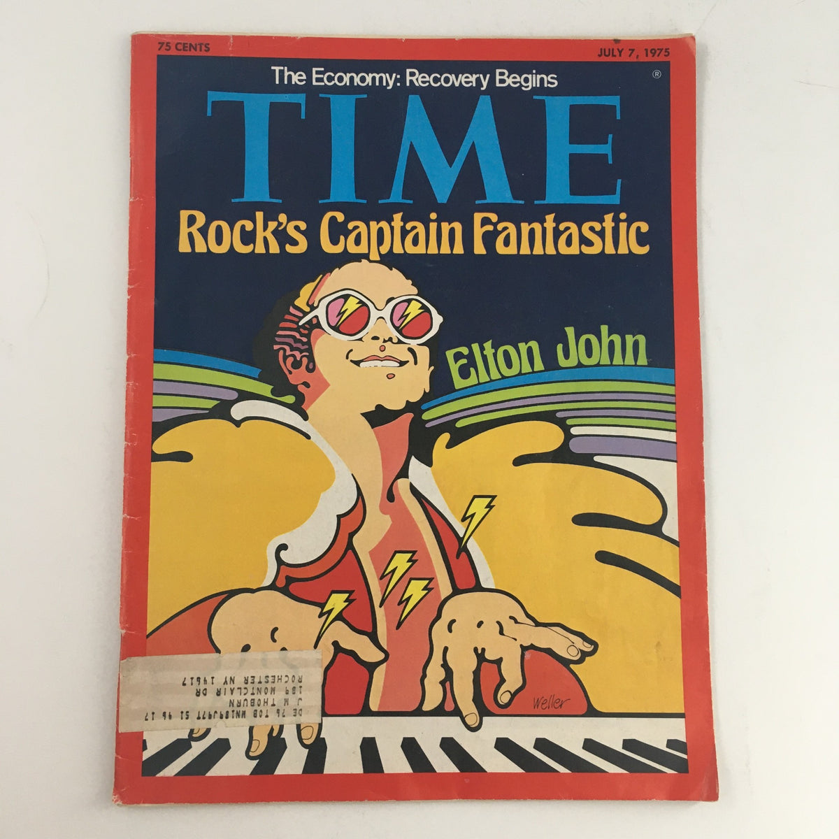 Cover of Time Magazine from July 7, 1975, featuring an illustration of Elton John as 'Rock's Captain Fantastic'. The vibrant cover highlights Elton John's iconic style and includes the title, making it a significant collectible for music history enthusiasts.