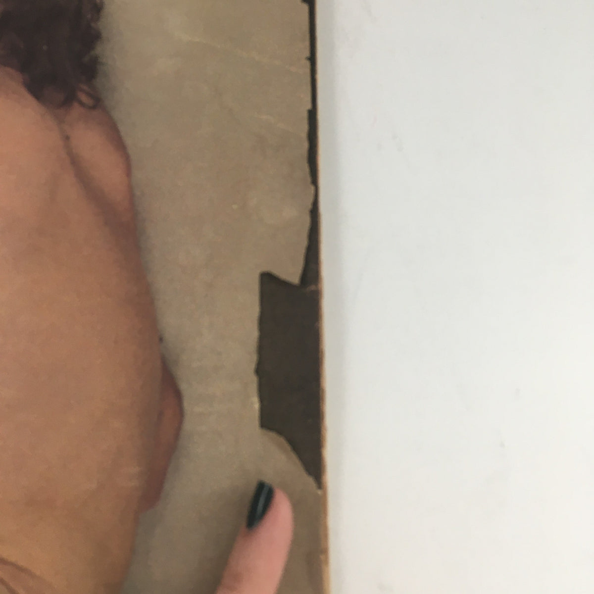 Close-up of the edge of the Rolling Stone Magazine January 22 1981, showcasing the visible wear and tear, emphasizing its vintage nature and authentic collectible status.