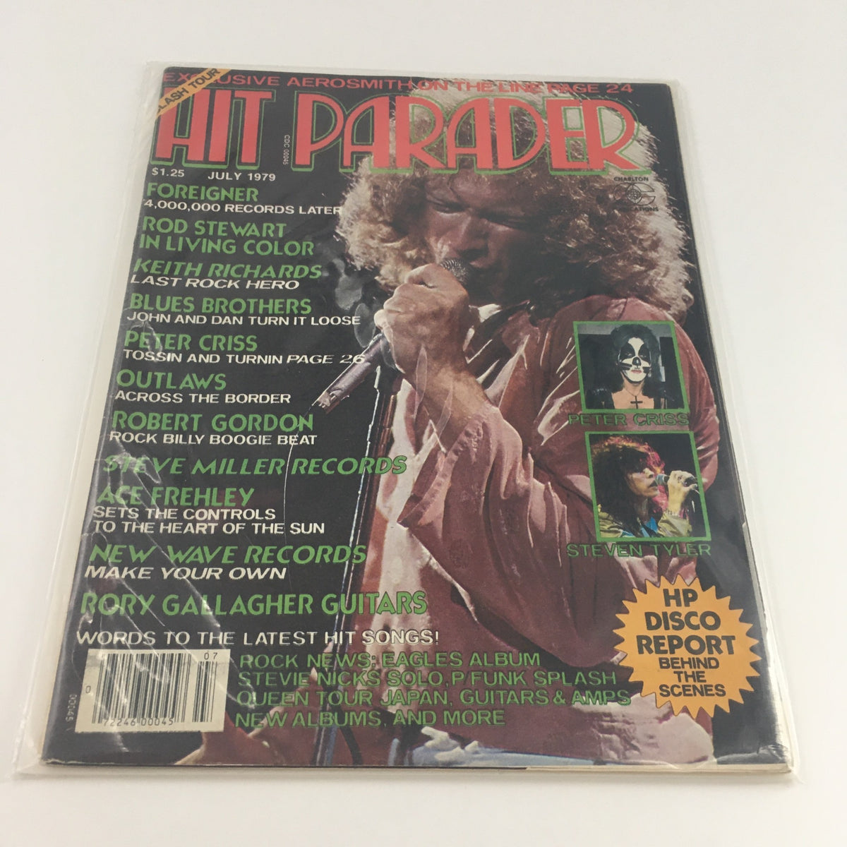 Hit Parader Magazine July 1979 with protective sleeve, highlighting Rod Stewart and Steven Tyler, capturing the essence of late 70s rock music.