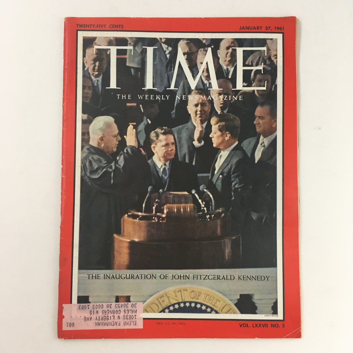Time Magazine January 27, 1961 featuring the inauguration of John F. Kennedy, showcasing a historic moment with JFK taking the oath of office. The cover captures the atmosphere and significance of this pivotal political event.