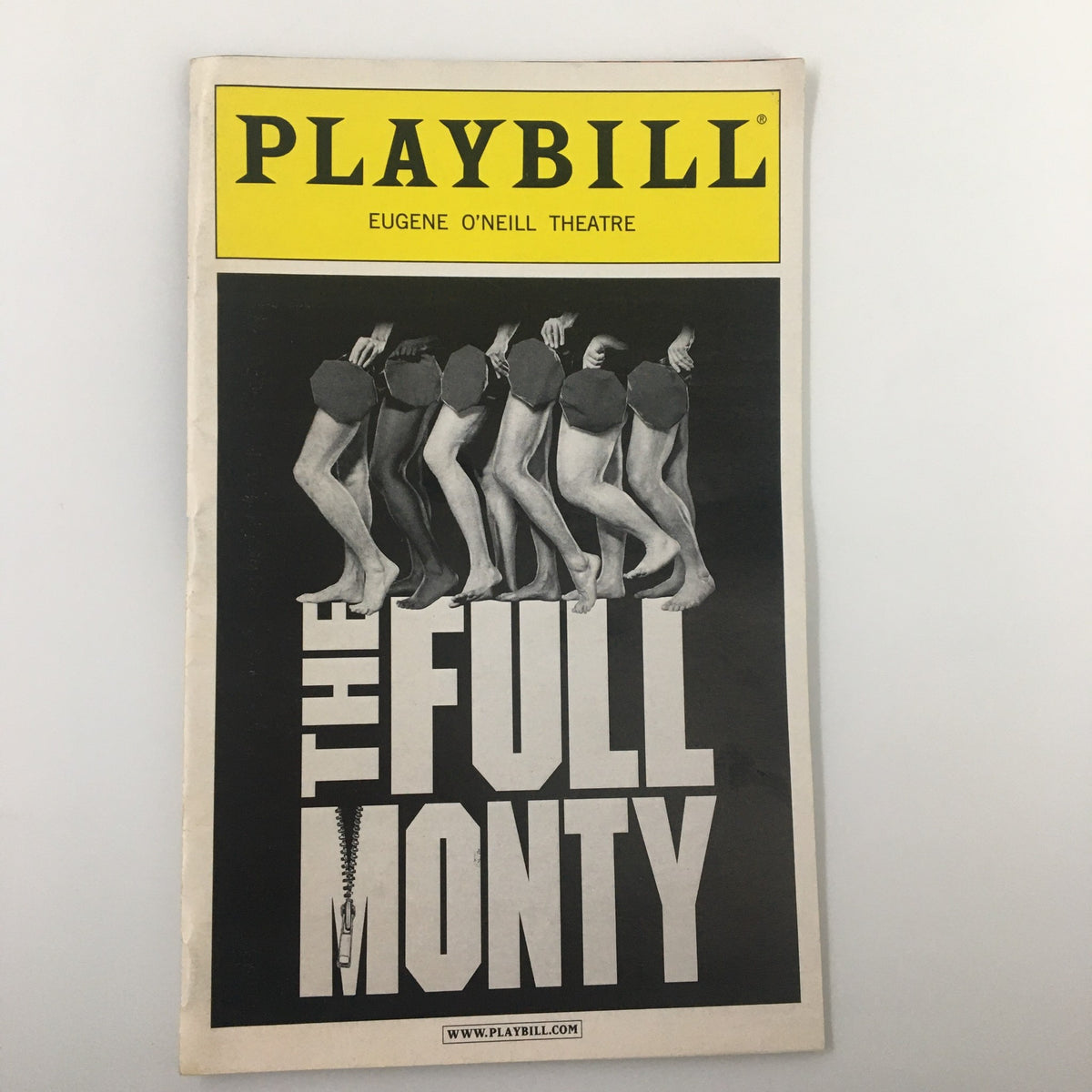 2002 Playbill for 'The Full Monty' at the Eugene O'Neill Theatre featuring a striking black and white design of dancers' legs, capturing the essence of the popular Broadway musical.