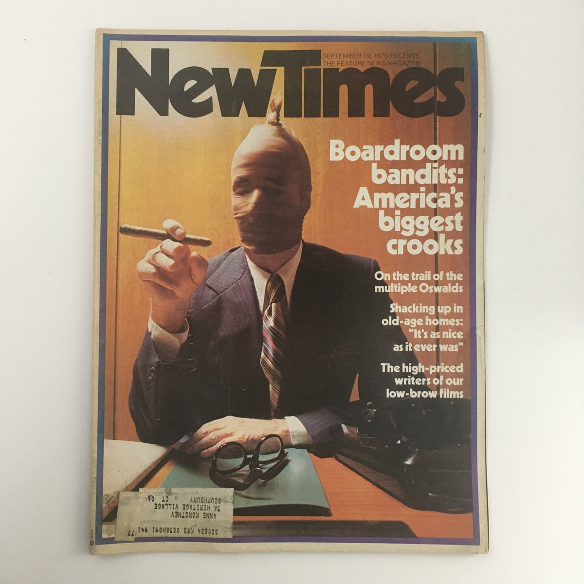 Cover of New Times Magazine dated September 19, 1975, featuring the title 'Boardroom Bandits: America's Biggest Crooks,' revealing a figure in a suit and a masked face, symbolizing corporate crime.