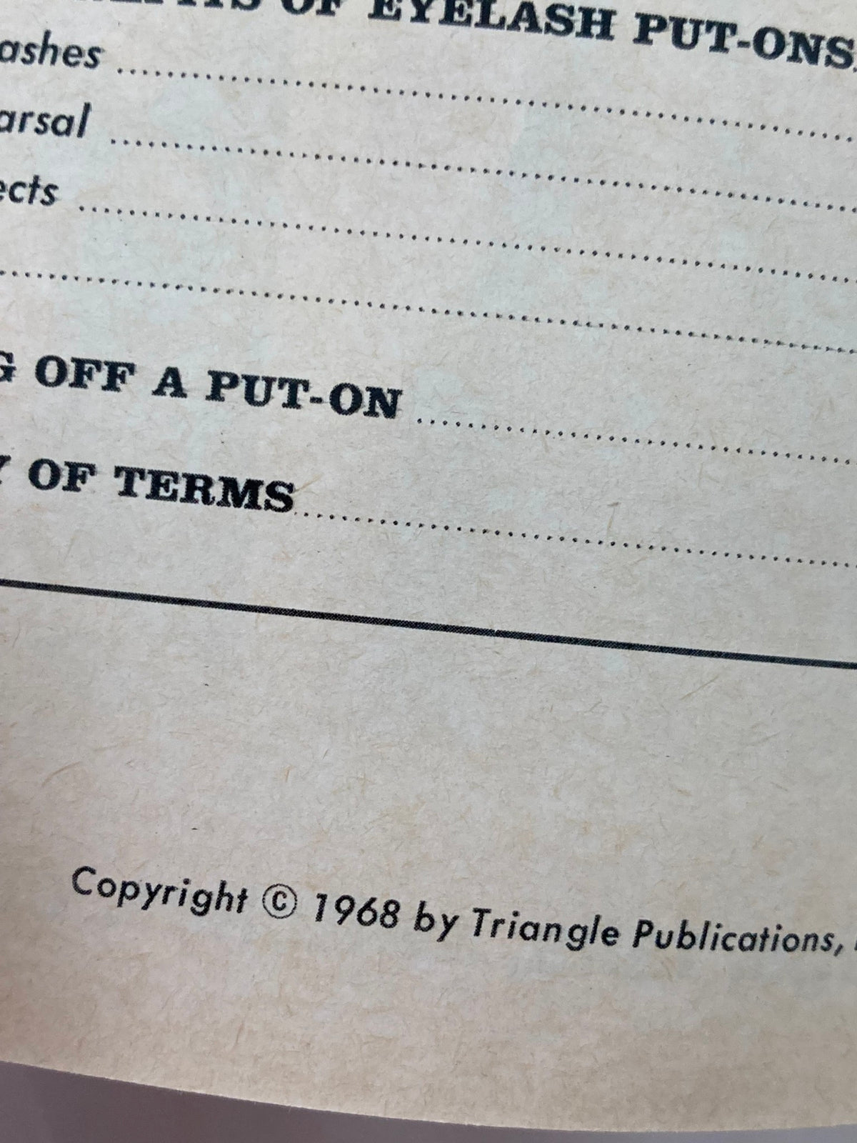 Close-up of the lower section of an interior page from the 1968 Seventeen Catalog 'The Great Hair Put-on,' featuring copyright information and a glimpse of the glossary of terms.