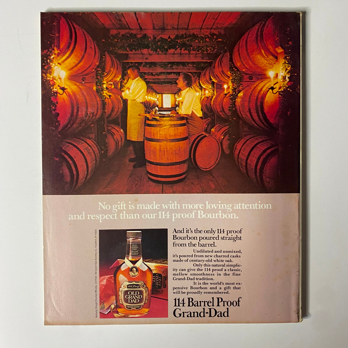 Back cover of Fortune Magazine December 13, 1982 featuring an advertisement for Old Grand-Dad Bourbon, showcasing barrels and distillers in a vintage setting.