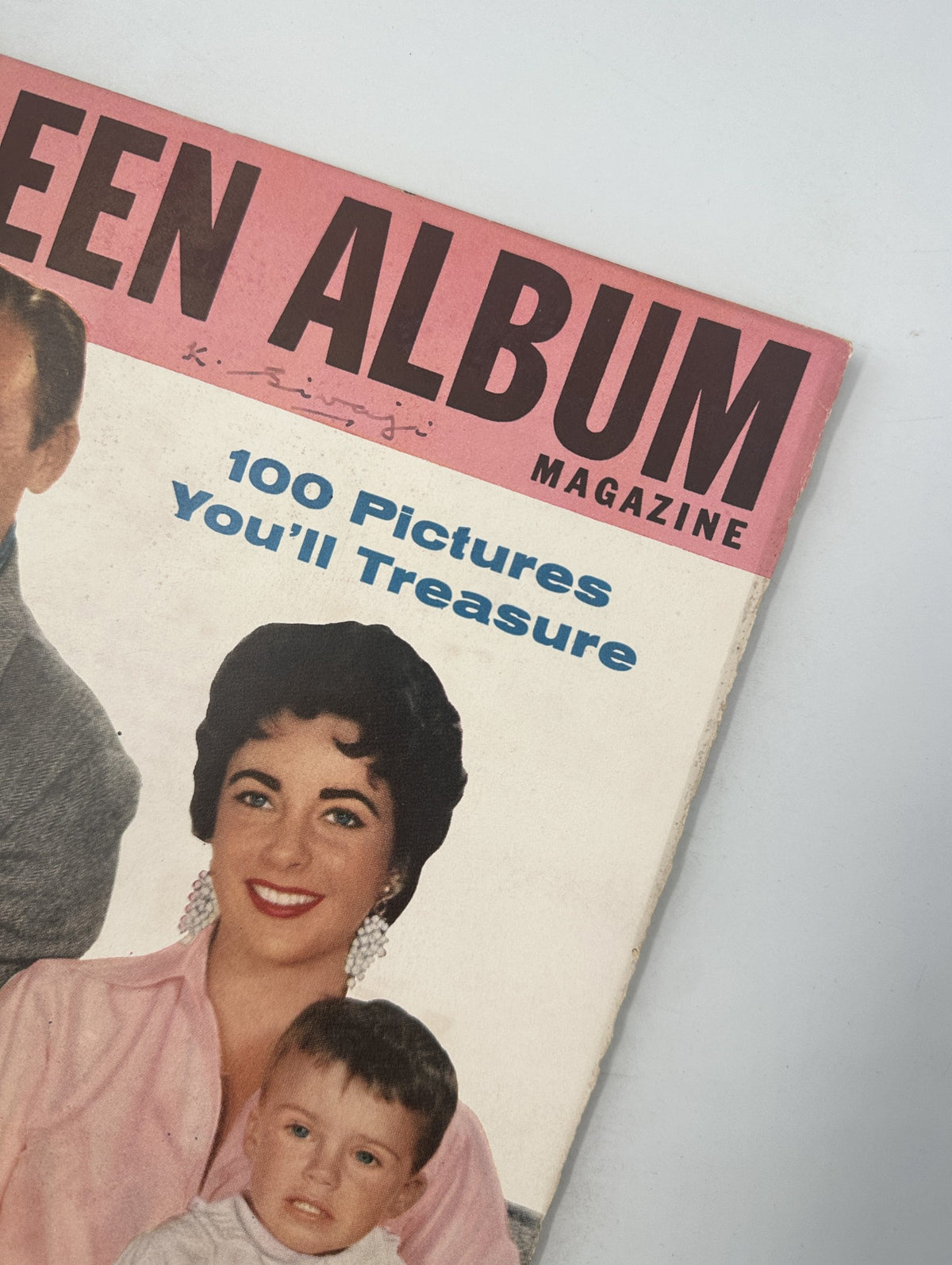 Close-up of the Screen Album Magazine title from May 1956, showcasing the tagline '100 Pictures You'll Treasure.' The image focuses on Elizabeth Taylor's iconic appearance.