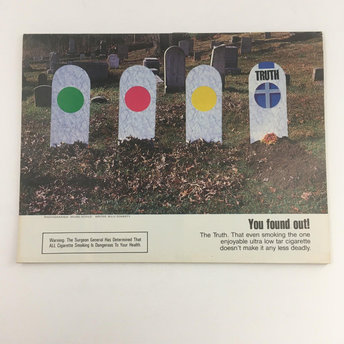 Back cover of Mad Magazine June 1983 No. 239 featuring a graveyard scene with colorful gravestones and a humorous anti-smoking message.