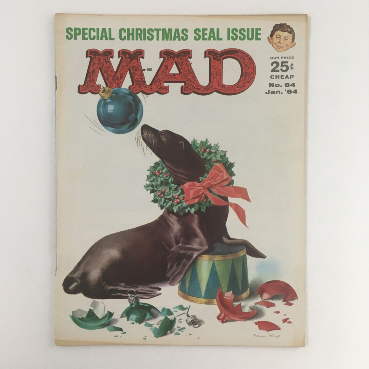 Mad Magazine January 1964 No. 84 Special Christmas Seal cover featuring a playful seal with a Christmas wreath, capturing the humor and artistry of the vintage publication.