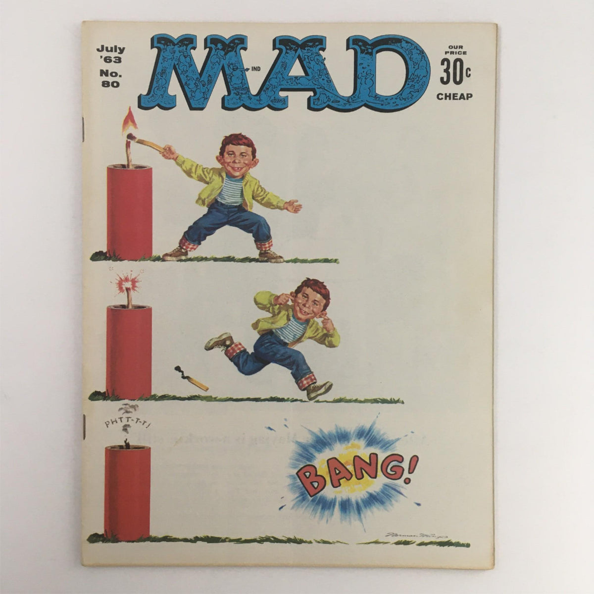 Cover of Mad Magazine July 1963 No. 80 featuring a colorful illustration titled 'Dynamite x Bang', showcasing a playful character lighting fireworks with humorous expressions and the text 'BANG!'. This vintage magazine is graded Fine FN 6.0, ideal for collectors.