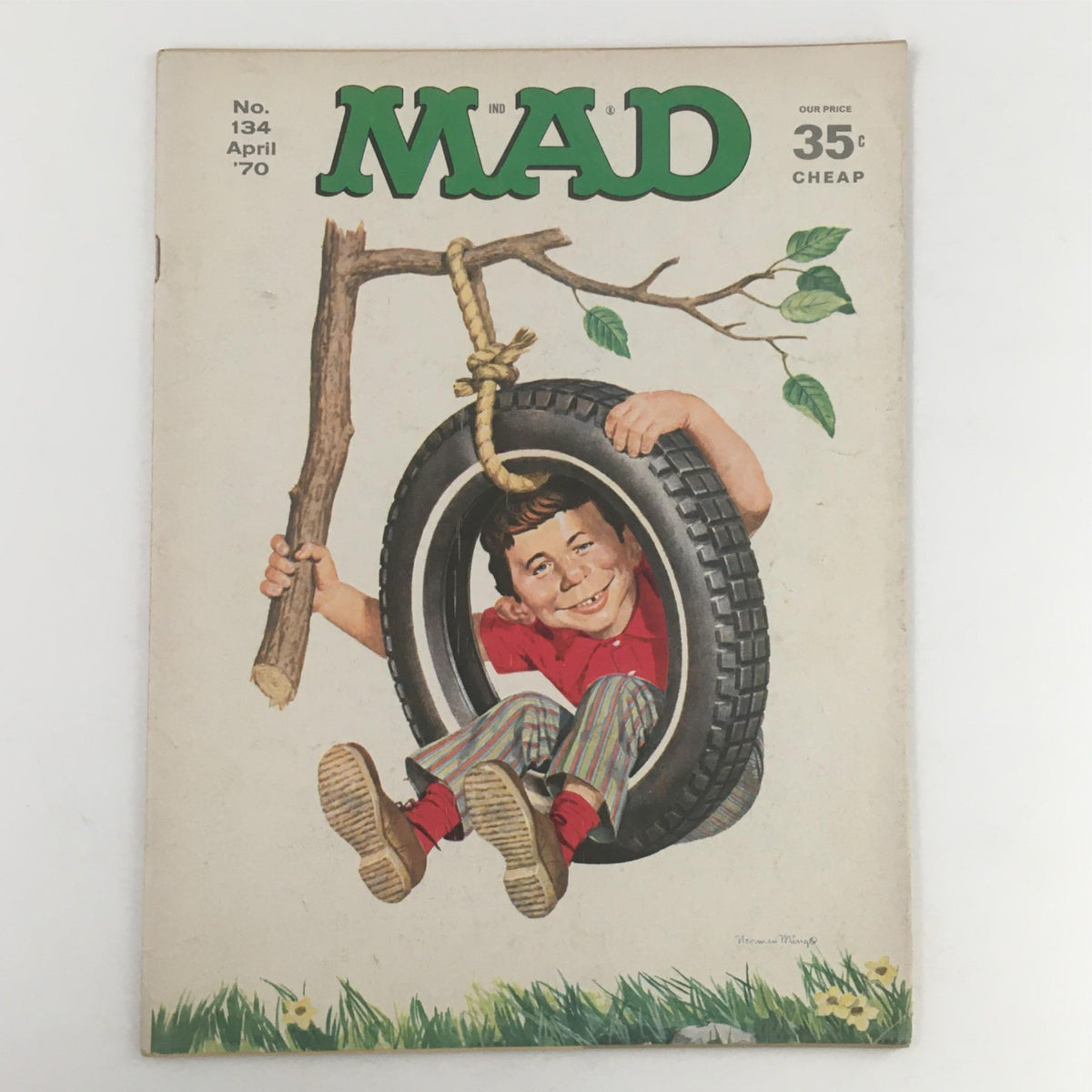 Mad Magazine January 1970 No. 134 Tire Swing No Label Fine FN 6.0 cover featuring a boy smiling while sitting on a tire swing, showcasing vintage humor and 1970s nostalgia.