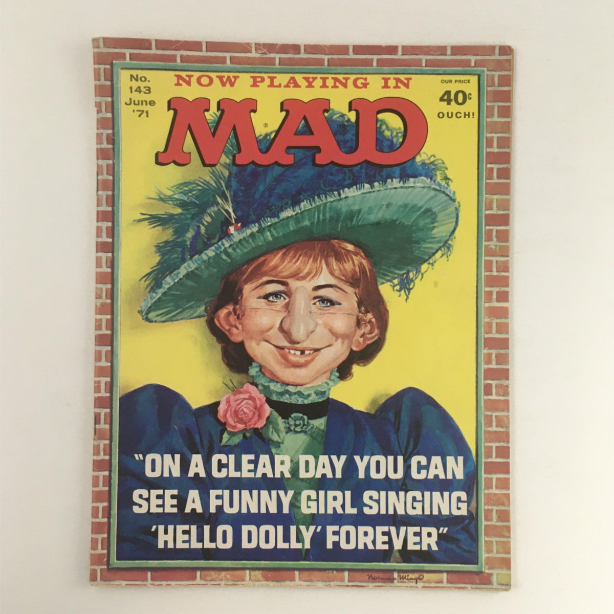 Cover of Mad Magazine June 1971 No. 143 featuring a caricature of a girl with a large hat and humorous expression, with the caption about seeing a funny girl singing 'Hello Dolly!'.