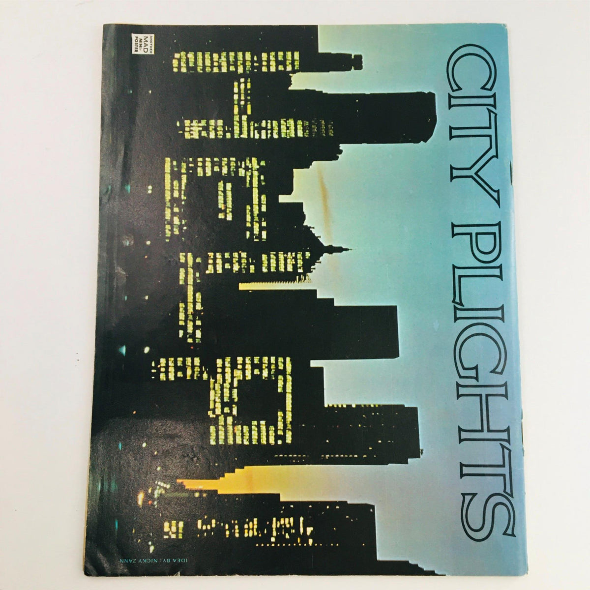 Cover of Mad Magazine March 1976 No. 181 Salutes The Bicentennial Year, featuring a blend of urban skyline imagery and bold typography, representing the spirit of the era.