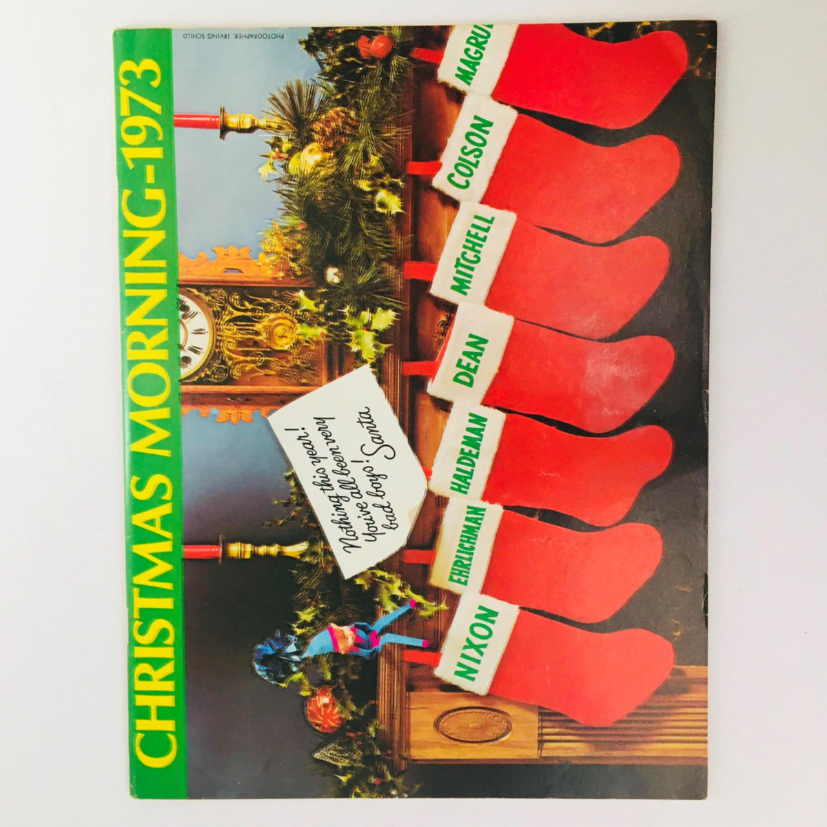 Cover of Christmas Morning 1973 magazine featuring festive red stockings and a Christmas-themed setup, showcasing a humorous take on holiday traditions.