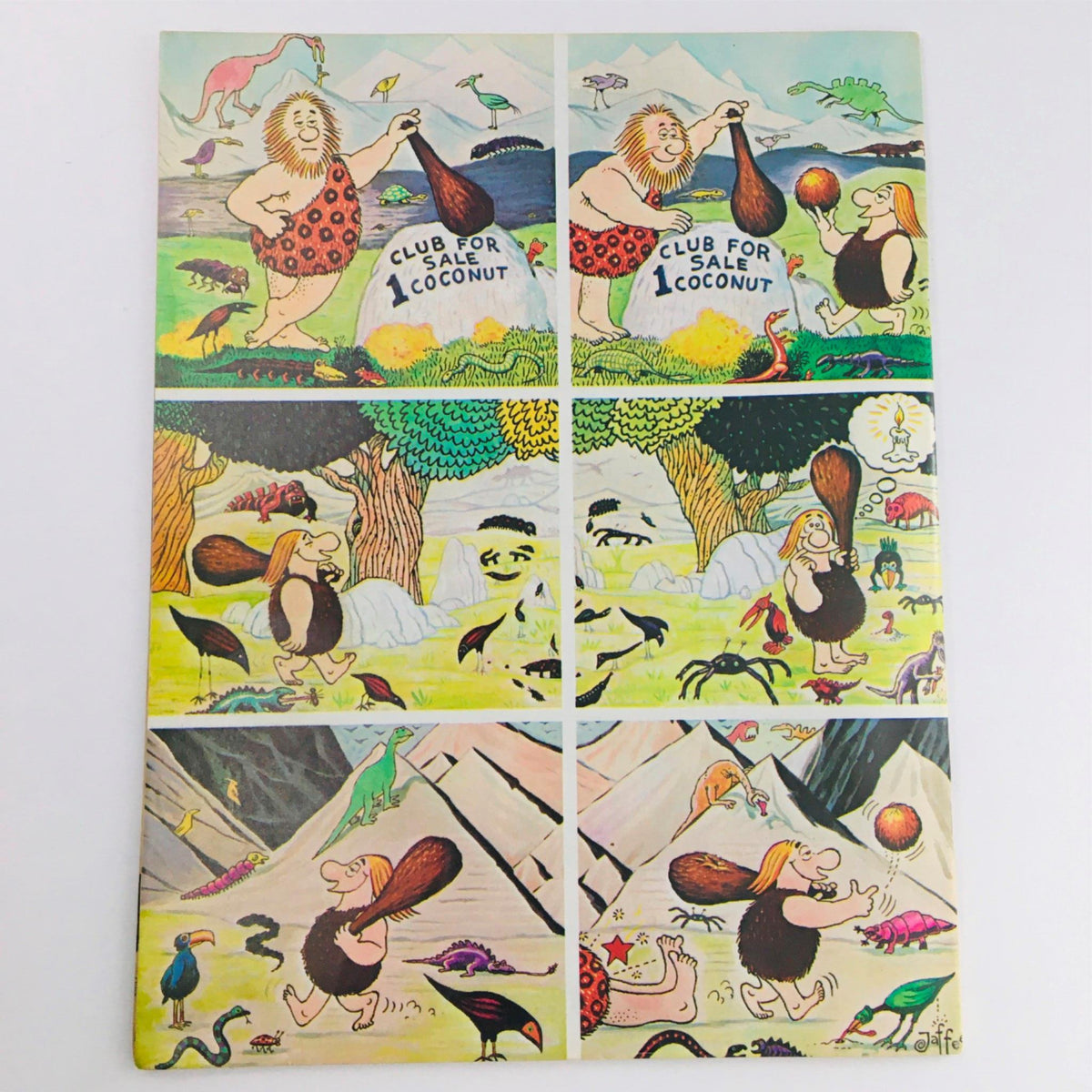 Back cover of Mad Magazine December 1980 No. 219 showcasing colorful cartoon panels of prehistoric characters, emphasizing the magazine's unique style and humor.