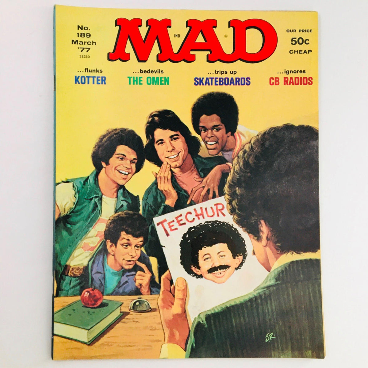 Cover of Mad Magazine March 1977 No. 189 featuring Welcome Back Kotter with humorous artwork and characters posing around a desk. Collectible vintage magazine in Fine/Near Fine condition.