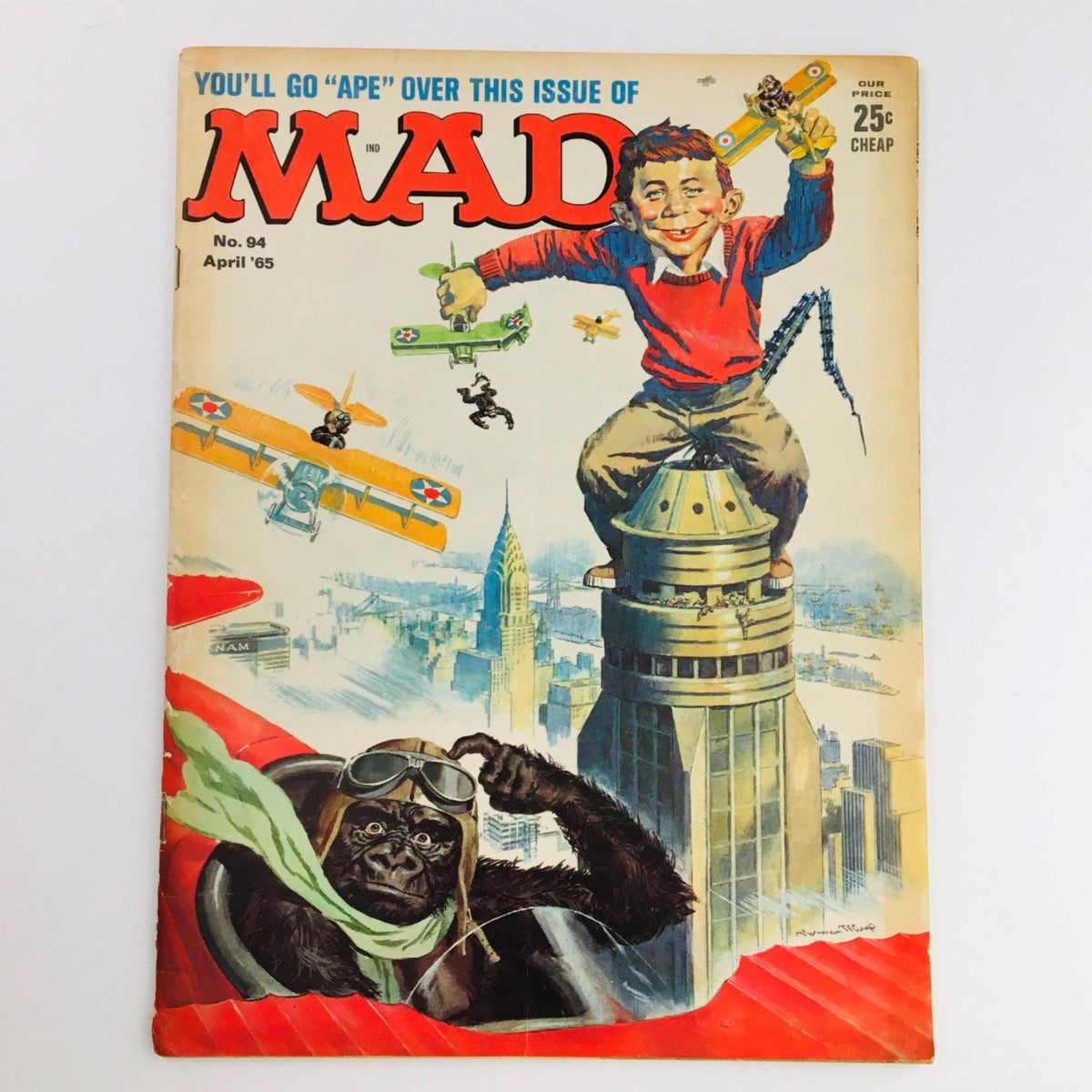 Cover of Mad Magazine April 1965 No. 94 featuring King Kong on a plane, with a colorful illustration including a boy in a red sweater and vintage airplanes, showcasing pop culture humor from the 1960s.
