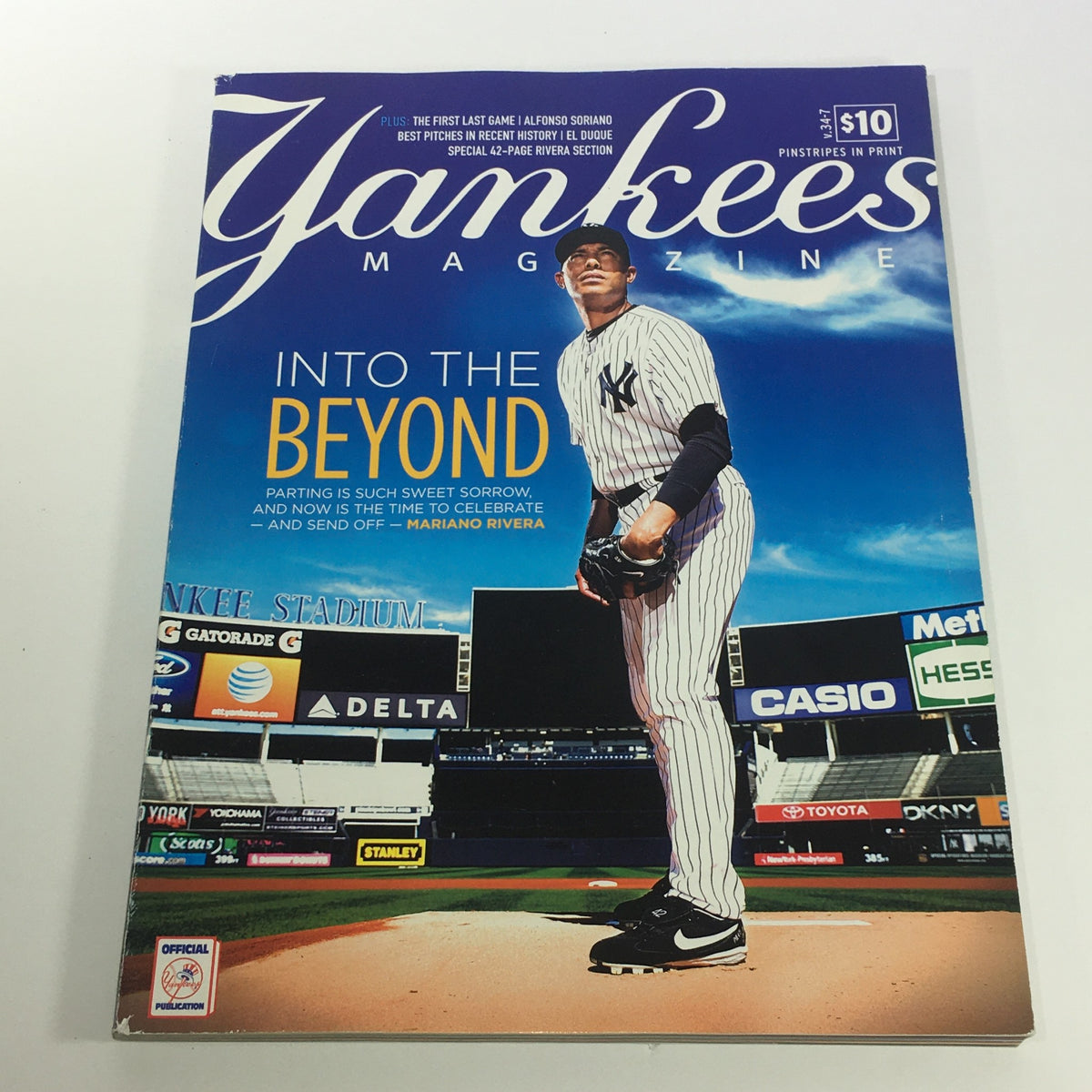 Yankees Magazine: September 2013 Volume #34-7 featuring Mariano Rivera on the cover, highlighting his farewell season in Major League Baseball. This vintage issue captures the essence of baseball history with a nostalgic design and prominent graphics.