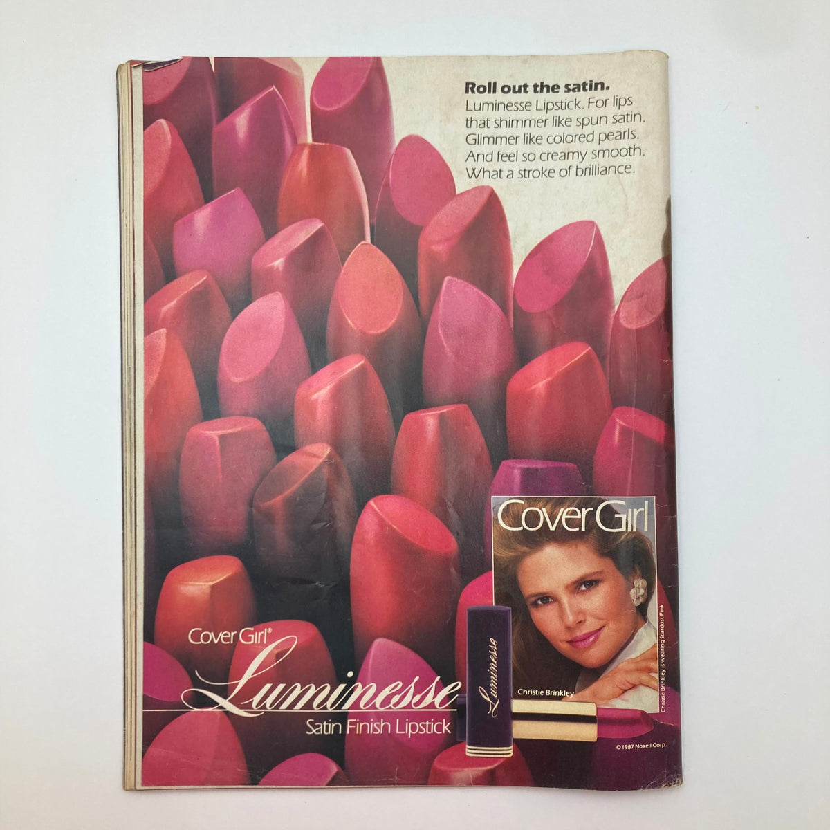 Cover of the VTG People Weekly Magazine July 20 1987 showcasing a stylish advertisement for CoverGirl Luminesse lipstick with vibrant shades of lipstick, embodying the beauty trends of the era. This collectible magazine offers insights into the lives of iconic figures like Princess Diana and Fergie.