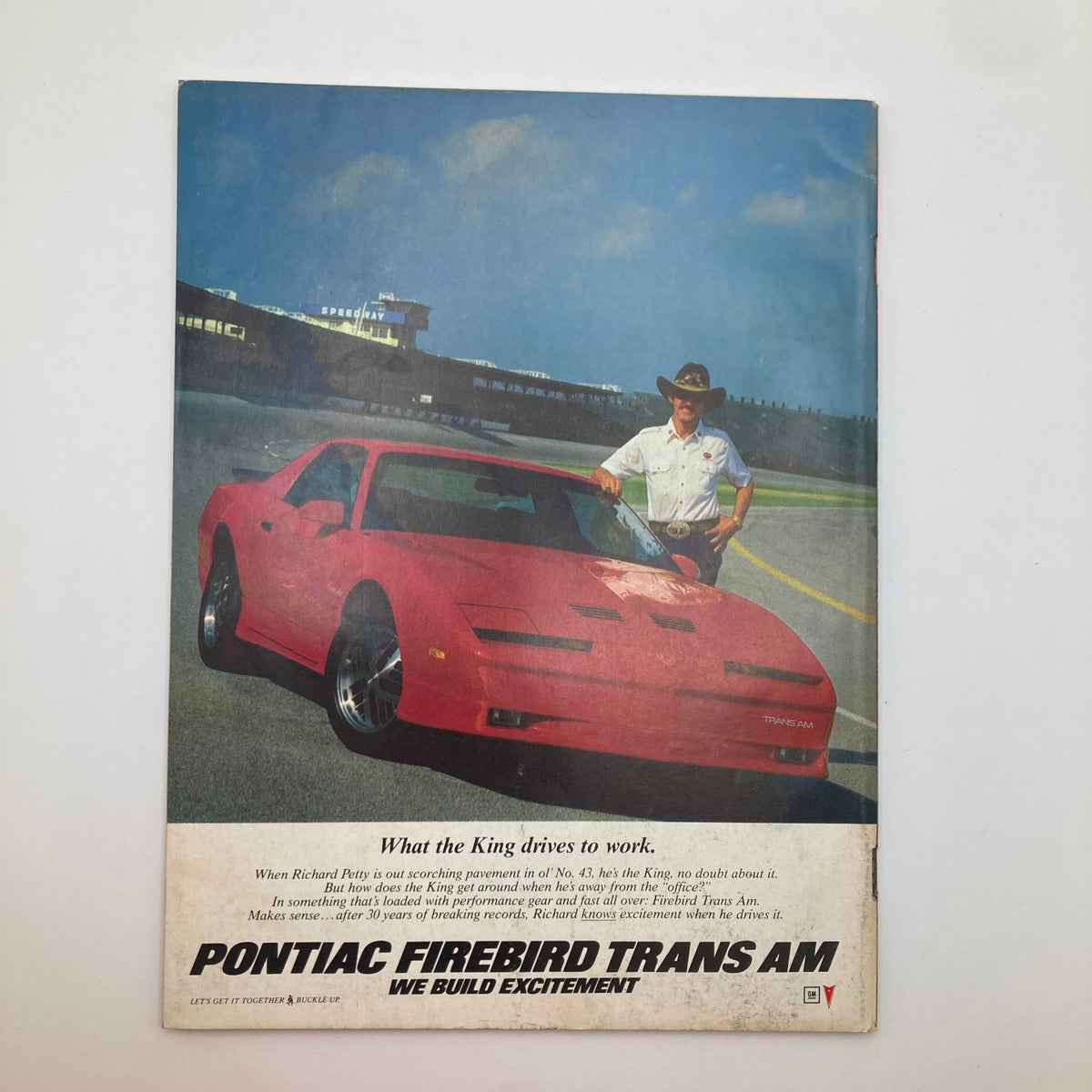 Cover image of VTG Stock Car Racing Magazine from October 1986 featuring a red Pontiac Firebird Trans Am with Richard Petty, showcasing the excitement of stock car racing and vintage automotive culture.