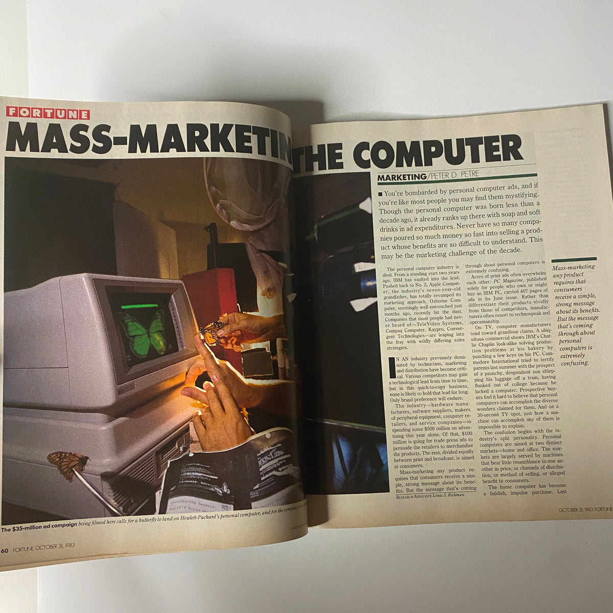 Inside page of Fortune Magazine from October 31, 1983, featuring the article 'Mass-Marketing the Computer' by Peter D. Petre, showcasing a vintage personal computer and hands engaging with the interface.