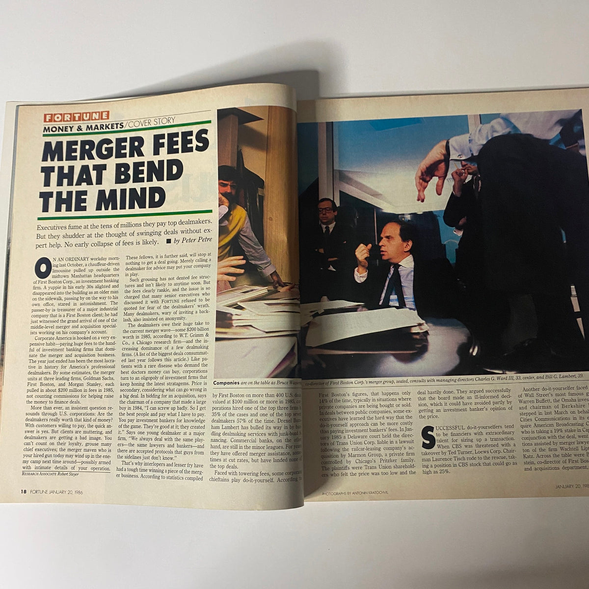 Fortune Magazine cover story from January 20, 1986 featuring 'Merger Fees That Bend the Mind' with an image depicting a corporate meeting discussing investment banking deals and trends.