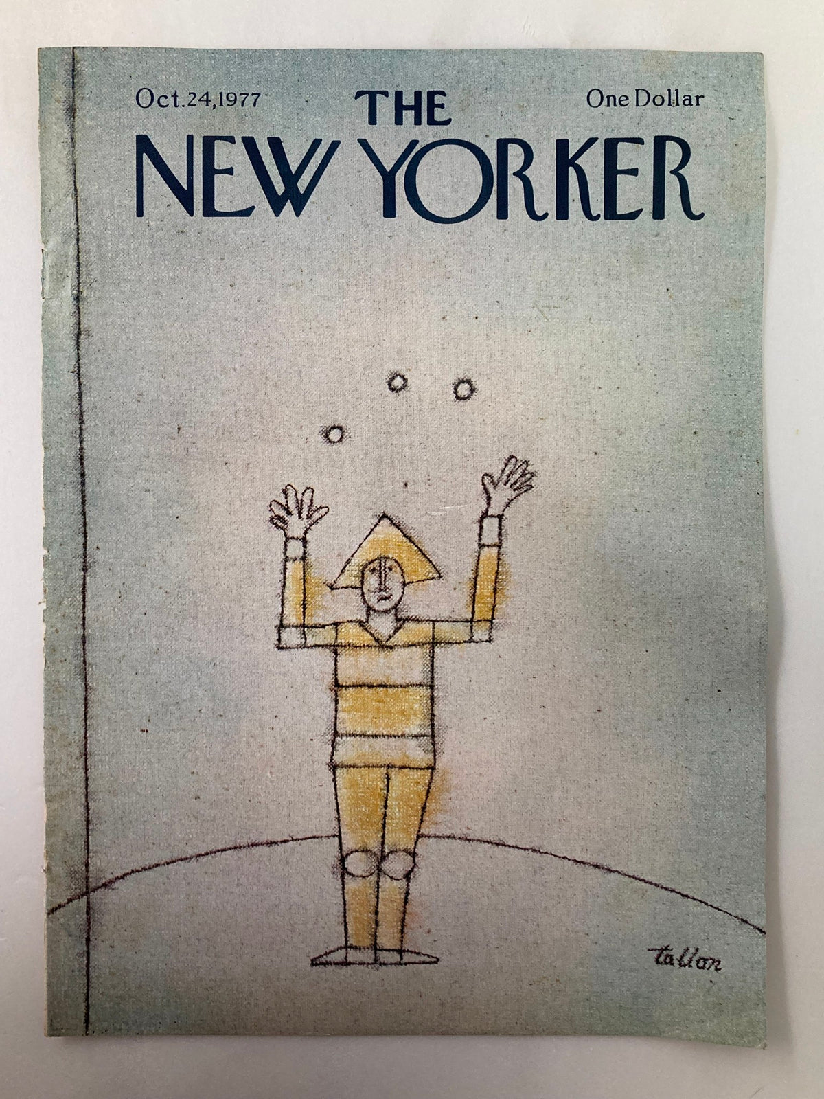 Cover of The New Yorker magazine from October 24, 1977, showcasing the art "Juggler" by Robert Tallon, with a juggler character in yellow and a light blue background.