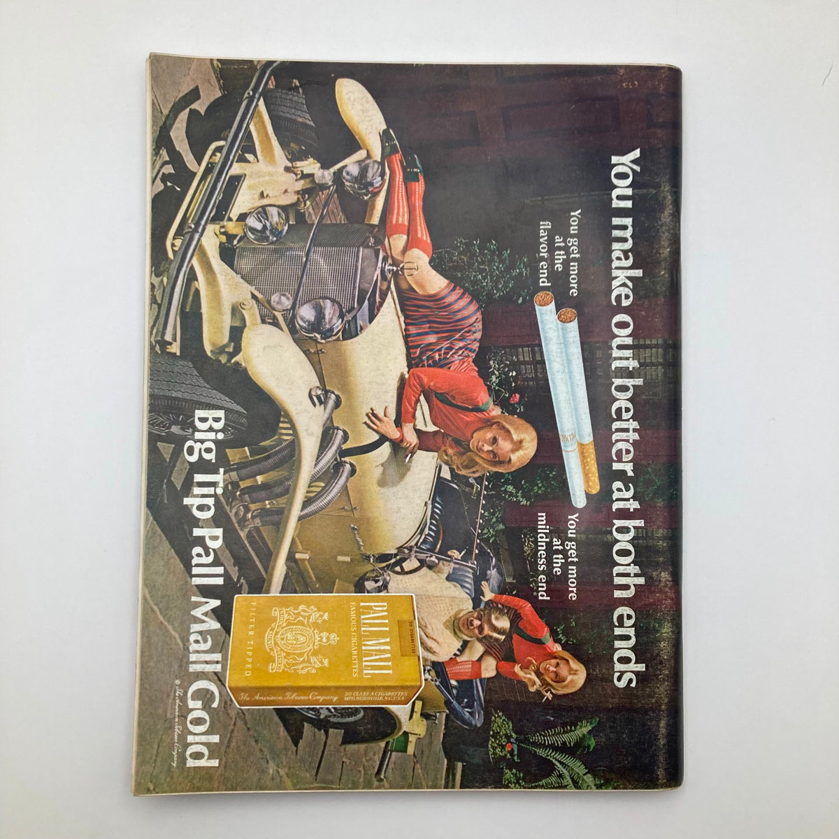 Cover of VTG Playboy Magazine November 1968 depicting a vintage advertisement with models by a classic car, illustrating the retro aesthetic of the era.