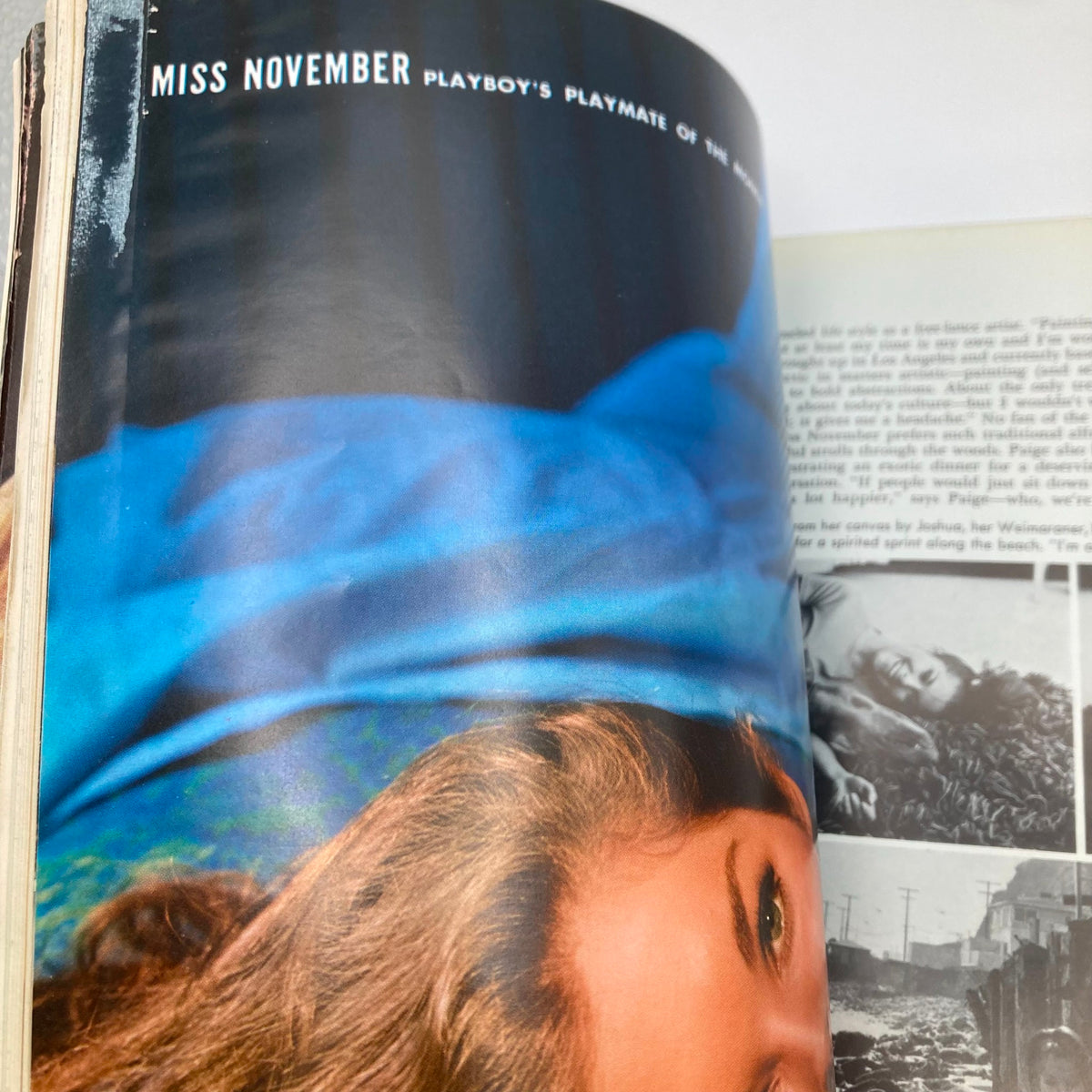 Inside image of VTG Playboy Magazine November 1968 showcasing Playmate Paige Young with striking photography and colorful design.