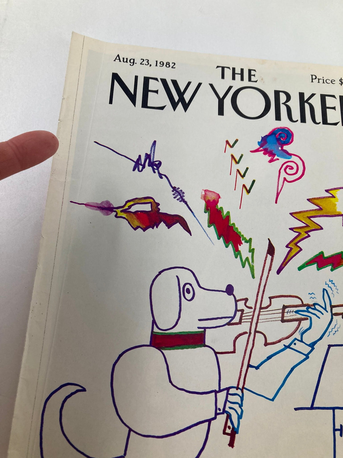 Cover of The New Yorker magazine from August 23, 1982 featuring a whimsical illustration titled 'Dog Plays' by Saul Steinberg. The artwork displays a dog with a bow and a violin, colorful doodles, and vibrant details reflecting the playful nature of Steinberg’s style.