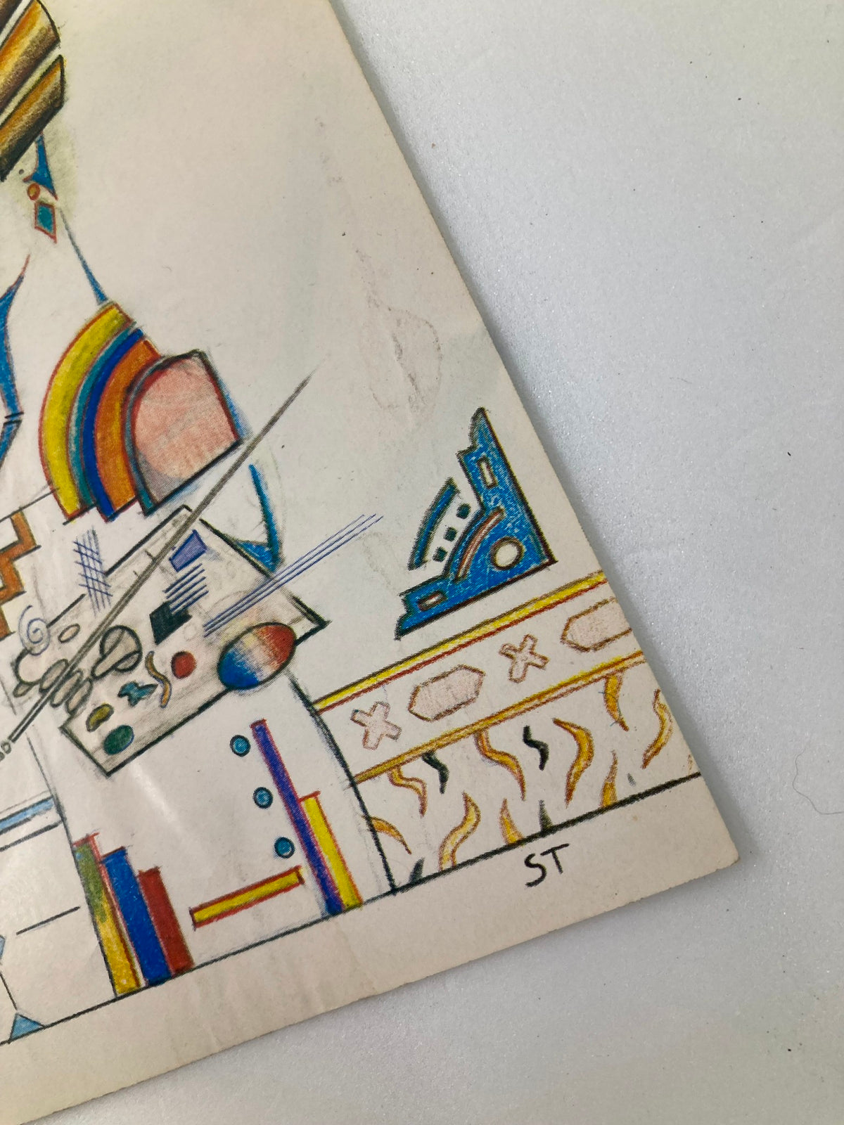 Close-up of the New Yorker cover from April 26, 1982, by Saul Steinberg, highlighting artistic elements and signature along the border.